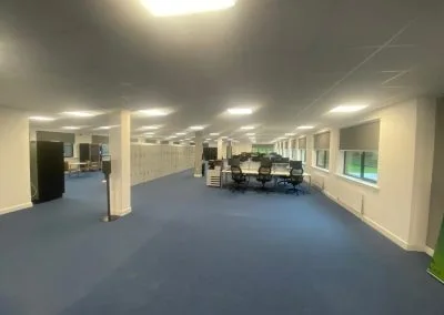 Ceiling-mounted blinds installed in business interior