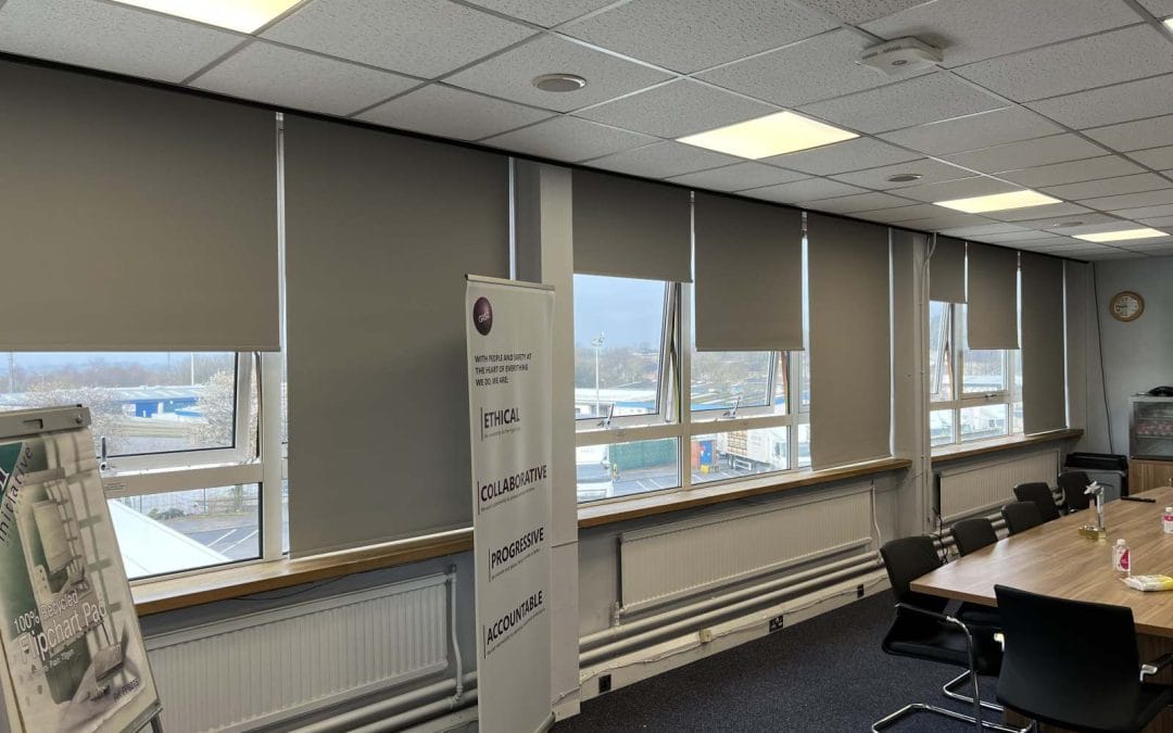Large office roller blinds installation in Glasgow workspace