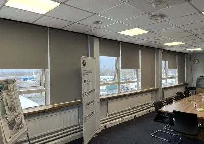 Large office roller blinds installation in Glasgow workspace